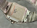 Cartier Santos watch caseback with stamped markings and stainless steel bracelet
