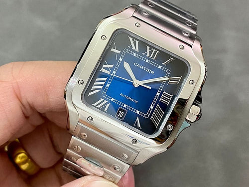 Cartier Santos watch with silver case, blue dial, and metal bracelet