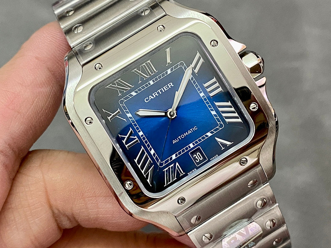 Cartier Santos watch close-up with blue dial, Roman numerals, and date window