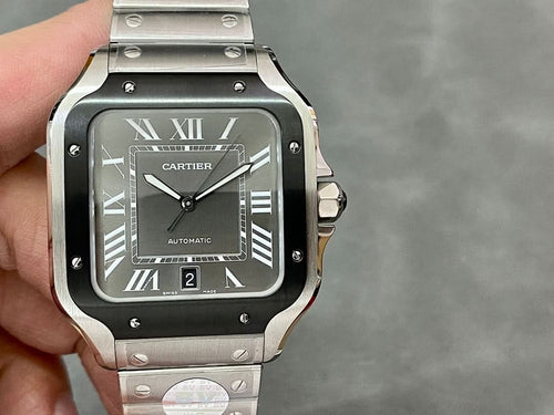Square wristwatch with black dial, Roman numerals, and steel case with bracelet
