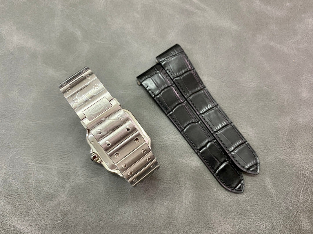 Two wristwatch straps with steel buckle—one black leather, one silver metal