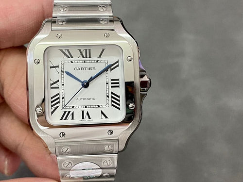 Square Cartier watch with white face, Roman numerals, and stainless steel bracelet