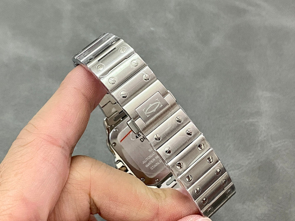 Stainless steel Cartier watch case and bracelet, viewed from the side