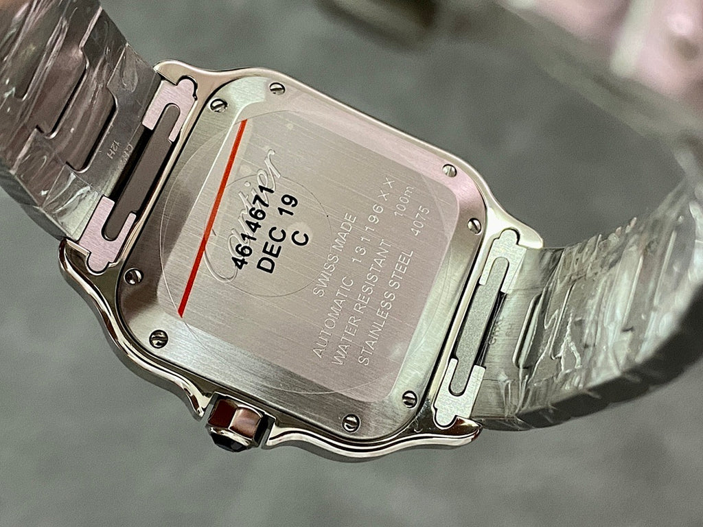 Stainless steel Cartier watch case back with engraved model and date text