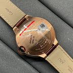 Cartier wristwatch caseback with engraved details and brown leather strap, rose-gold tone