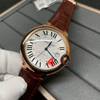 Cartier wristwatch on white glove with brown leather strap and Roman numeral dial