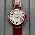 Cartier wristwatch with brown leather strap, round rose-gold case, Roman numeral dial