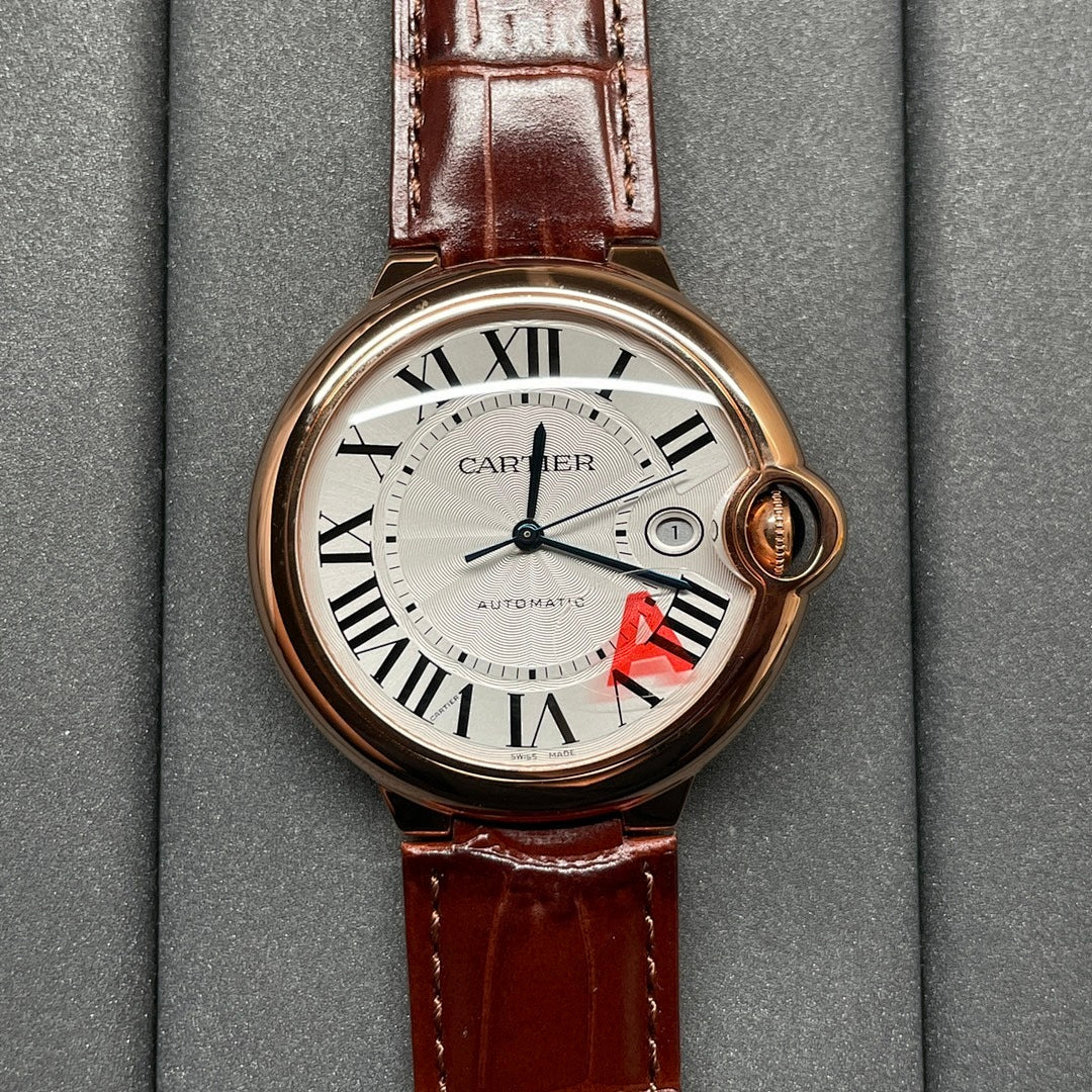 Cartier wristwatch with brown leather strap, round rose-gold case, Roman numeral dial