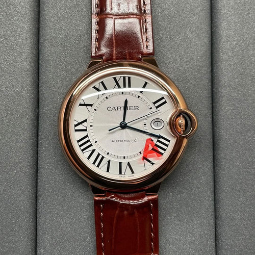 Cartier wristwatch with brown leather strap, round rose-gold case, Roman numeral dial