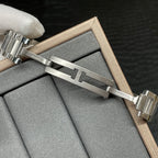 Cartier watch clasp with silver deployant buckle and black leather strap ends