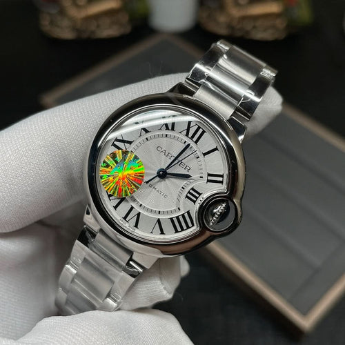 Cartier watch with silver stainless-steel bracelet and round white dial, Roman numerals