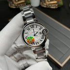 Cartier watch with silver bracelet, round white dial and Roman numerals, front close-up