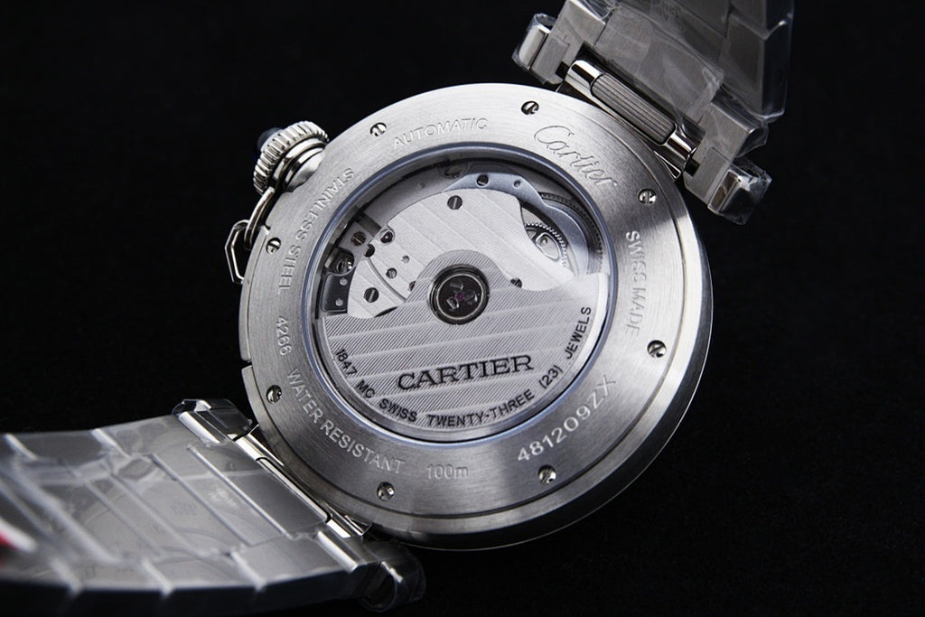 Cartier watch caseback with screw details and engraved markings, silver finish