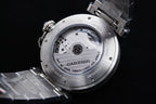 Cartier watch caseback with screw details and engraved markings, silver finish