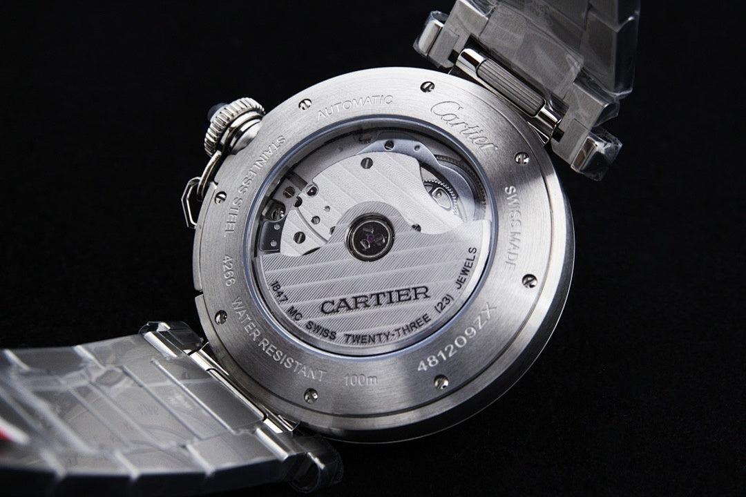 Cartier watch caseback with screw details and engraved markings, silver finish