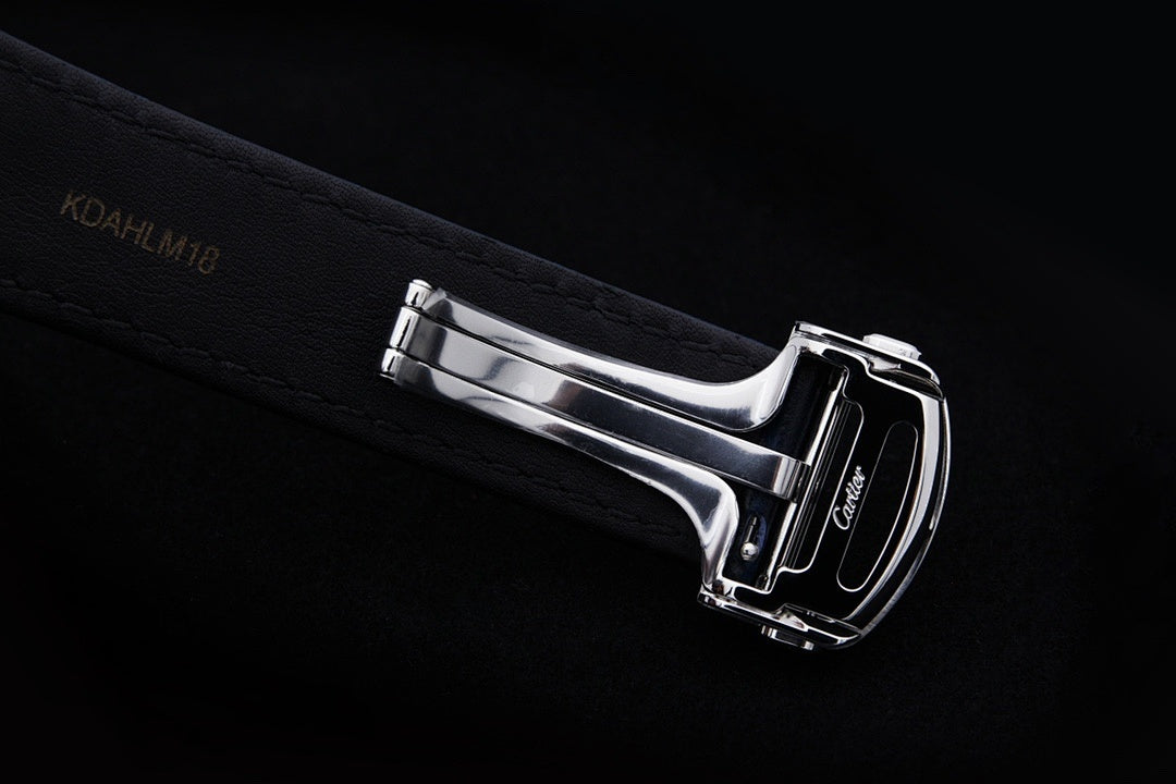 Cartier wristwatch with stainless clasp and dark blue leather strap, side profile