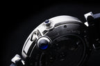Cartier wristwatch case close-up with crown and pushers on silver frame