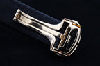 Cartier watch buckle clasp on dark leather strap with polished metal case