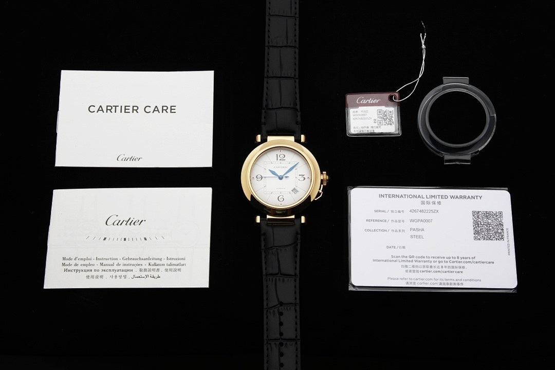 Cartier watch with black leather strap and included care and warranty documents