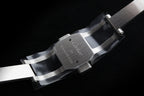 Cartier steel watch bracelet clasp and band link detail.
