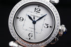 Cartier automatic wristwatch with white dial, diamond bezel, silver steel case and bracelet.