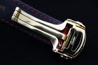 Cartier watch clasp and side detail, gold-tone case, red leather strap