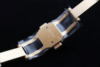 Gold watch clasp with engraved plate and metal link bracelet