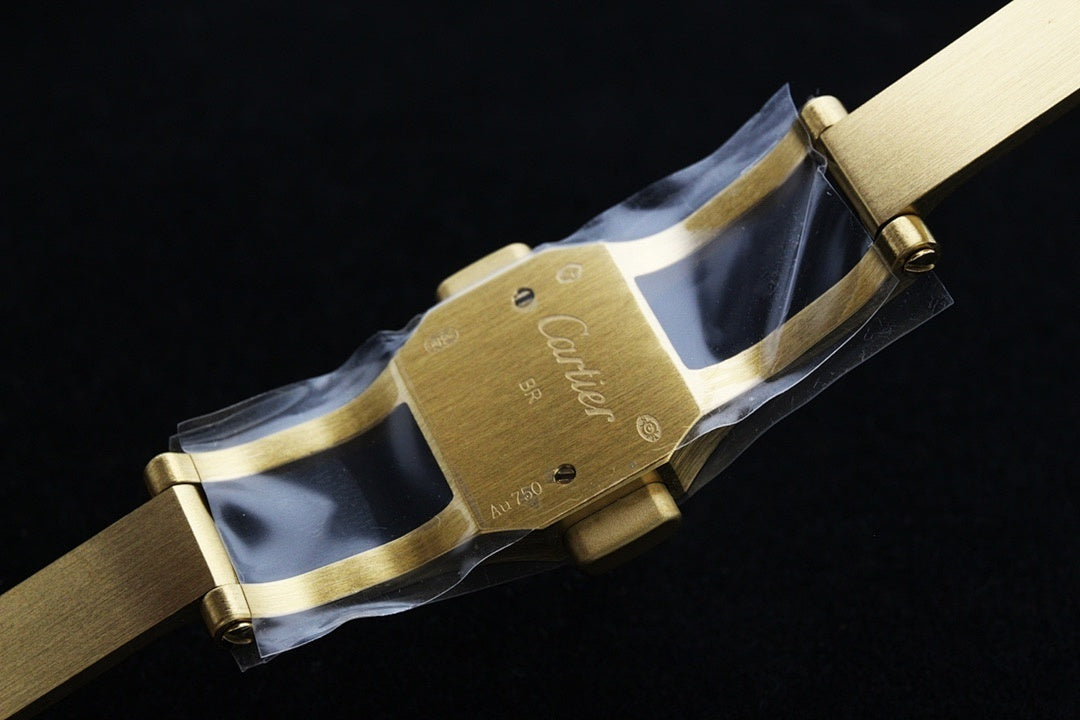 Gold-tone watch strap with clasp and engraved metal buckle