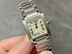Cartier rectangular wristwatch on silver bracelet, cream dial with Roman numerals and blue crown.