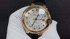 Cartier automatic watch, gold-tone round case, white dial with Roman numerals and date