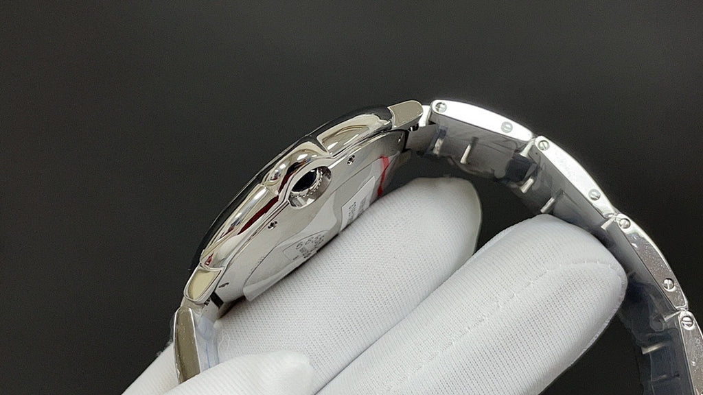 Cartier stainless steel watch side profile with crown and polished case lugs.
