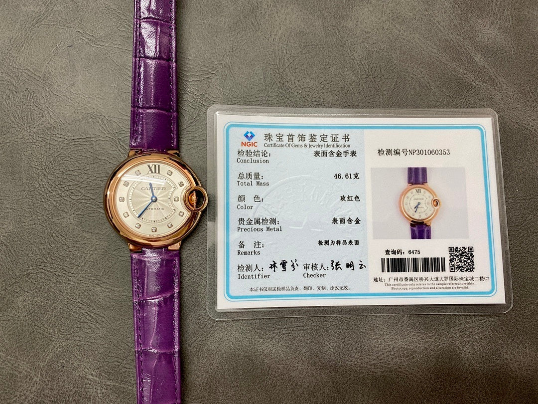 Cartier watch with purple leather strap and authentication card displayed nearby.