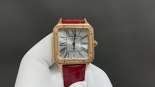 Cartier watch with gold-toned case, red leather strap, Roman numeral dial