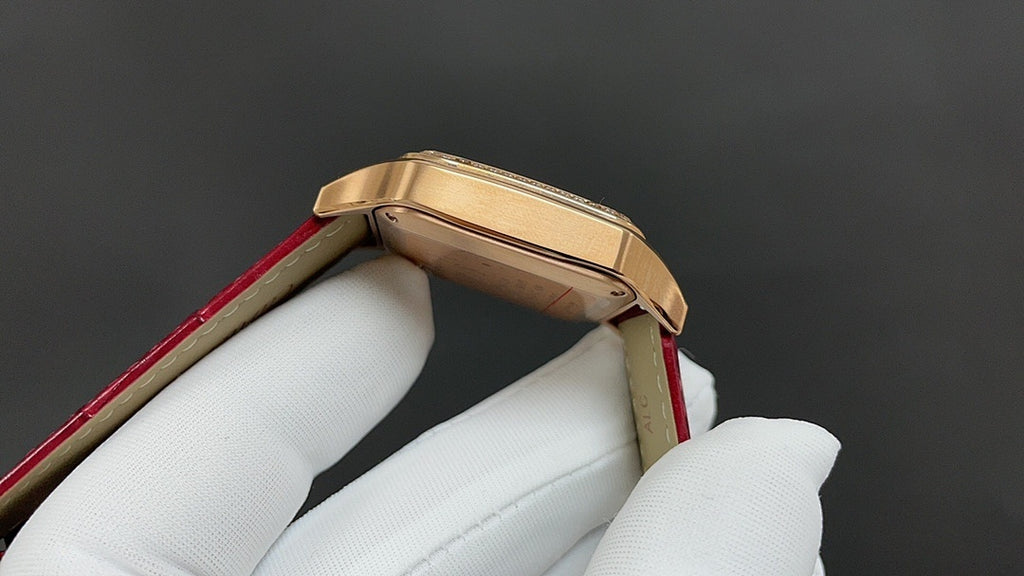Cartier watch side profile with gold-toned case and red leather strap
