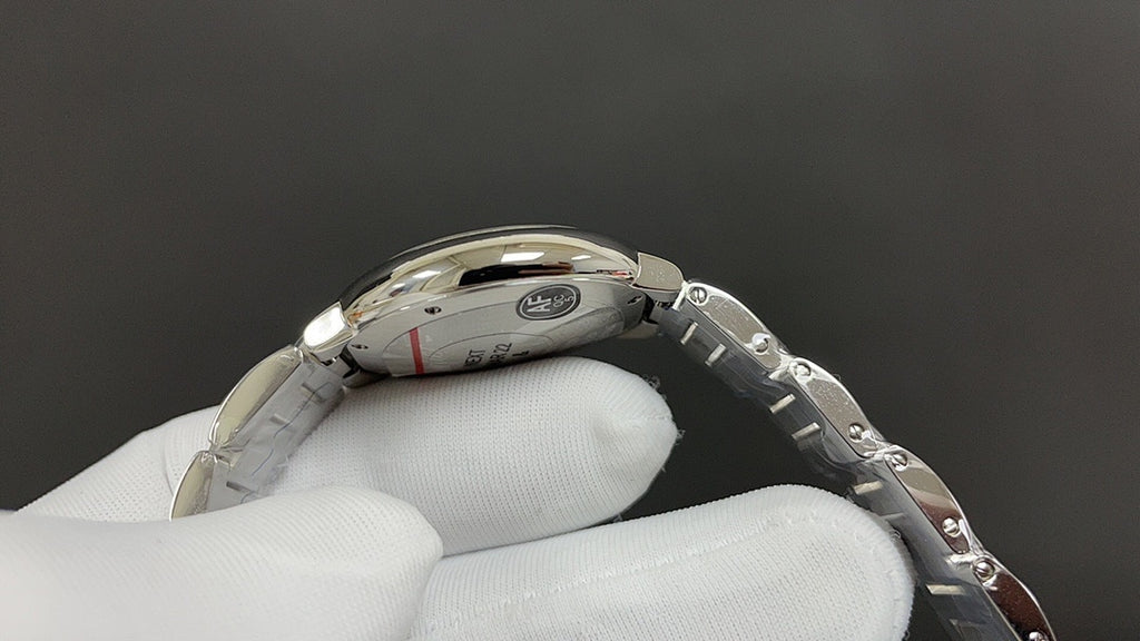 Stainless steel wristwatch caseback with engraved back and crown side