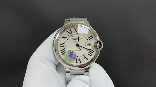 Cartier wristwatch with silver metal bracelet, white Roman numeral dial, crown at 3