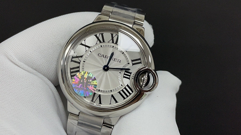 Cartier wristwatch front view with Roman numerals and rainbow-tinted dial