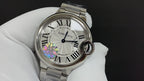 Cartier wristwatch front view with Roman numerals and rainbow-tinted dial