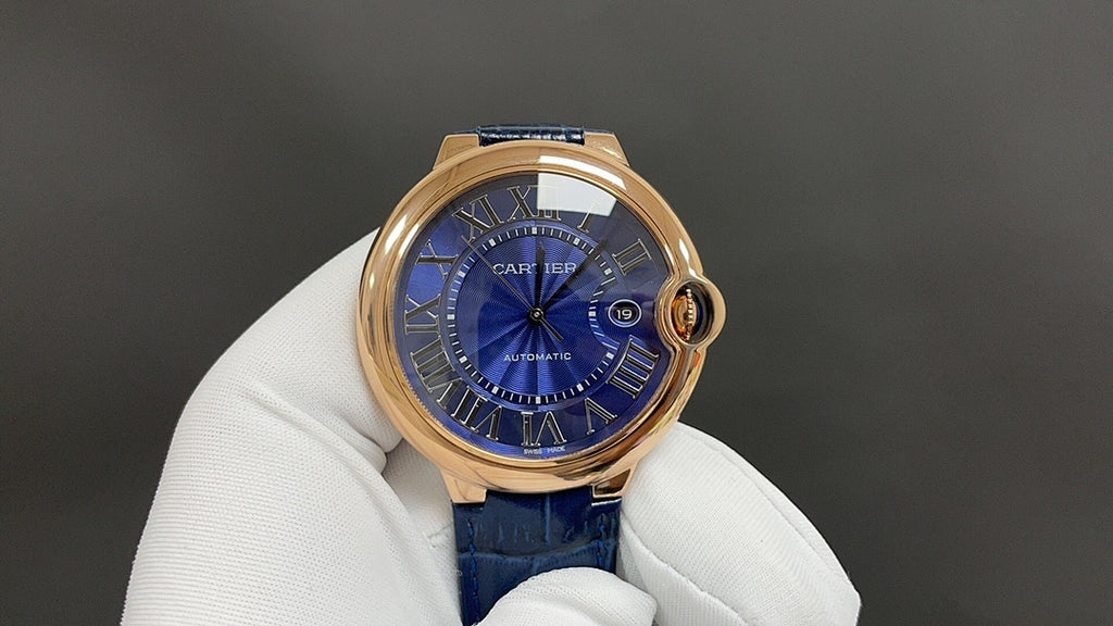Cartier wristwatch with blue dial and rose gold case, blue leather strap