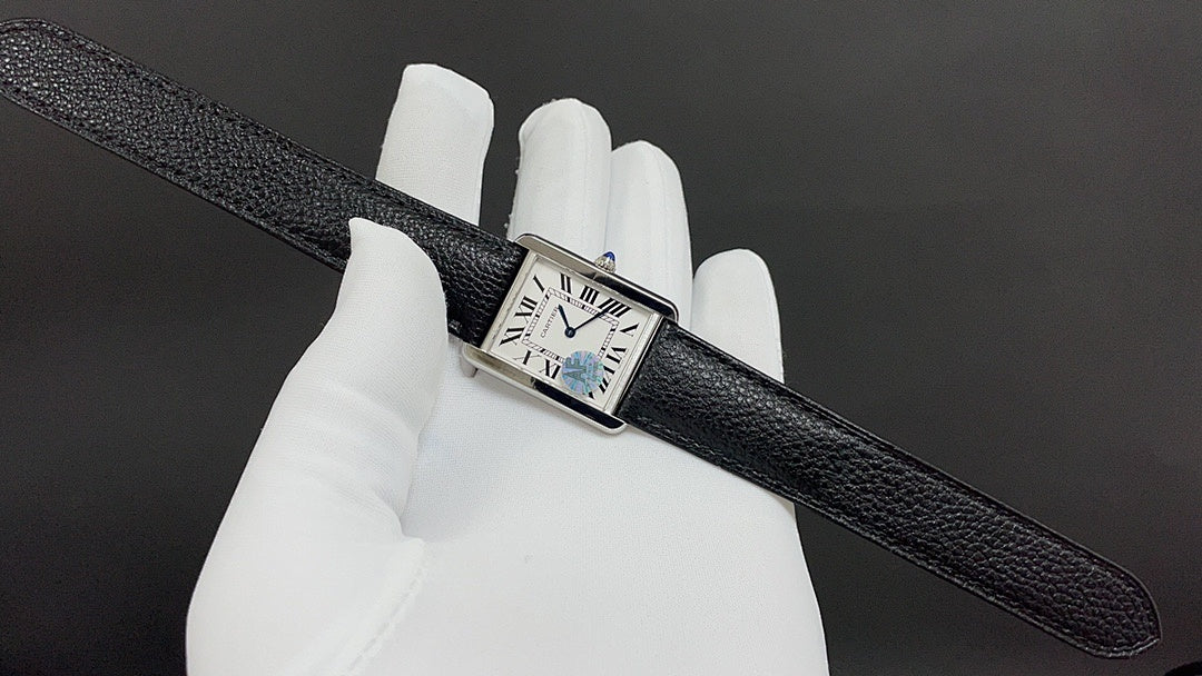 Cartier watch with black leather strap, square silver case, Roman numeral dial