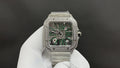 Cartier square diamond watch with green skeleton dial and steel bracelet