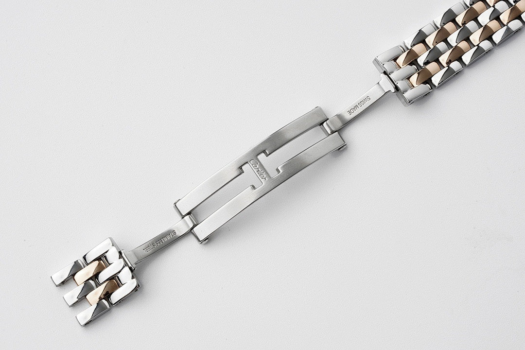 Two-tone metal bracelet with clasp and engraved links for Cartier watch