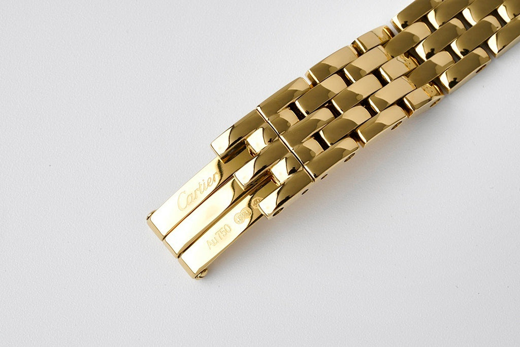 Gold-tone Cartier Tank watch clasp and bracelet links
