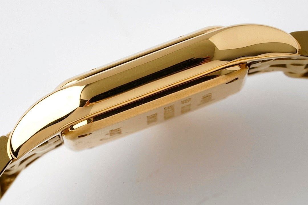 Gold-tone Cartier Tank watch side profile, smooth case with crown at left