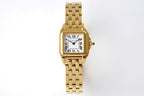 Gold-tone Cartier Tank watch with rectangular case and metal link bracelet