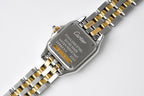 Cartier watch caseback with stainless steel text and gold detail on bracelet