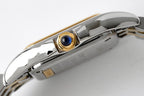 Cartier watch crown side with blue gemstone set in gold and stainless steel