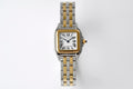 Cartier watch with gold and stainless steel bracelet, rectangular case, white dial