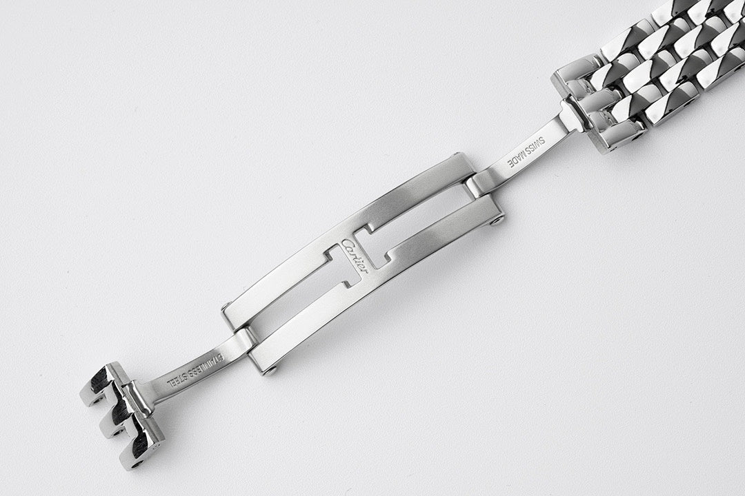 Cartier watch bracelet clasp and link details in silver stainless steel
