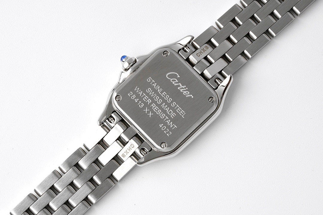 Cartier watch caseback in stainless steel with engraved text